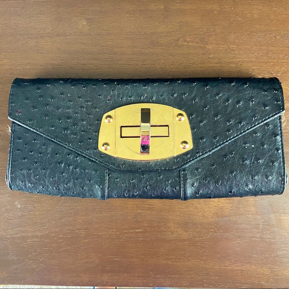 Black little hand purse with gold detail